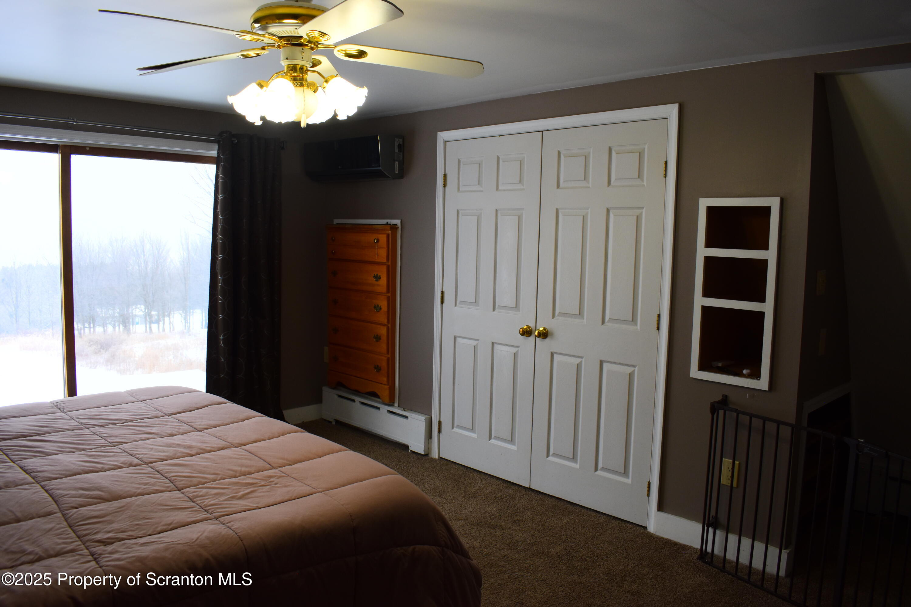 3003 Ridge Road Thompson, PA 18465 - Photo 17 of 33 a bedroom with a bed and a window