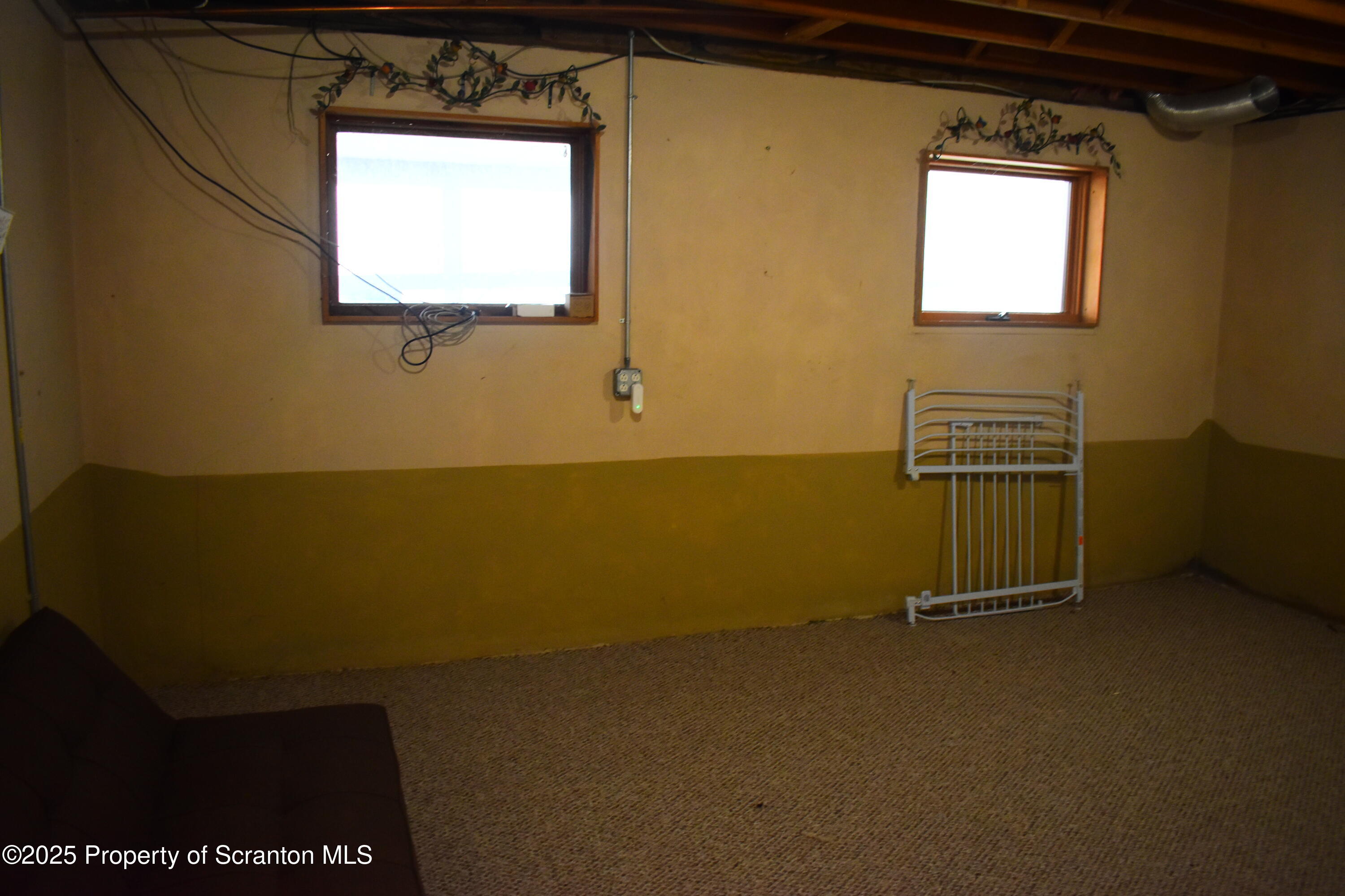 3003 Ridge Road Thompson, PA 18465 - Photo 24 of 33 a view of an empty room with a window