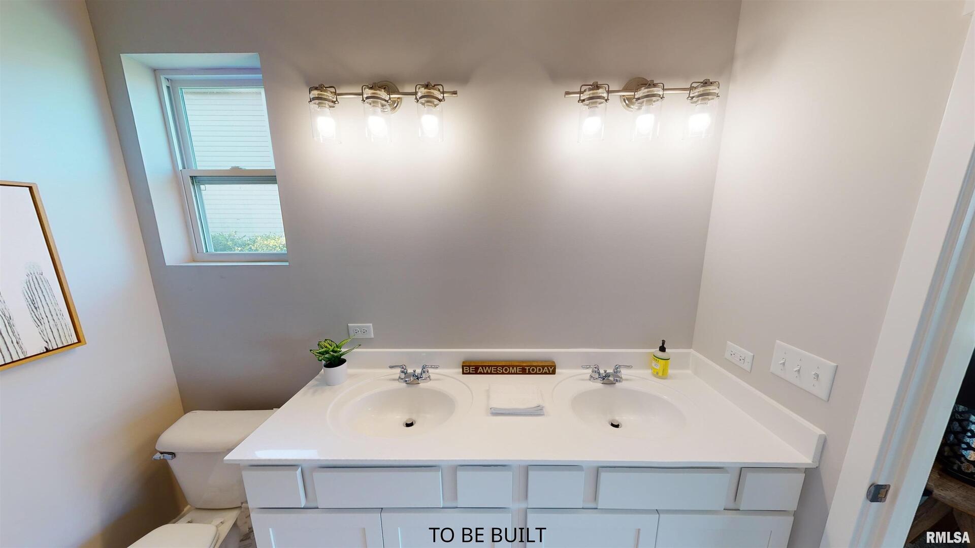 7 South 5th Street Eldridge, IA 52748 - Photo 21 of 23 a bathroom with a sink and a bathtub
