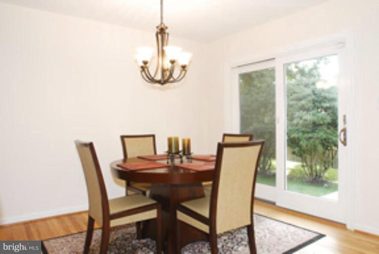 12621 Billington Road Silver Spring, MD 20904 - Photo 11 of 30 Chandelier and Sliding Door to Patio
