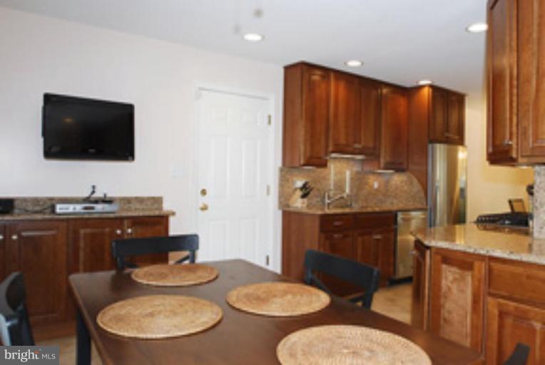 12621 Billington Road Silver Spring, MD 20904 - Photo 21 of 30 Kitchen hasRecessed Lighting & Entrance to Garage