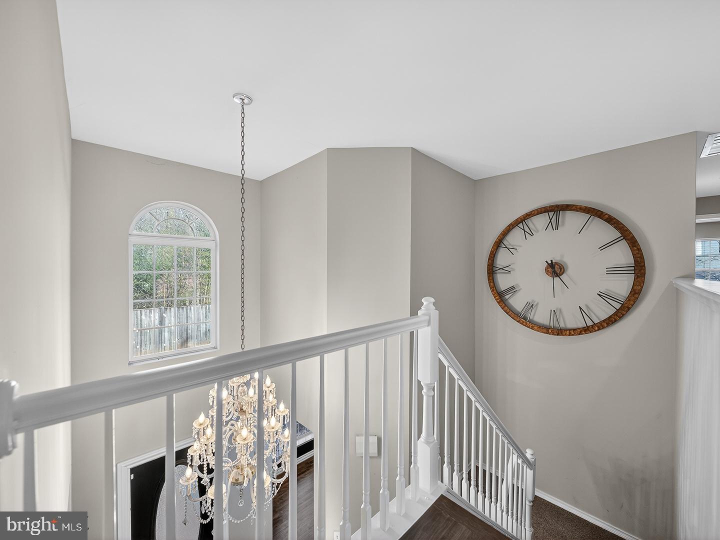 9534 Fernwood Road Bethesda, MD 20817 - Photo 18 of 44 a view of a hallway with windows