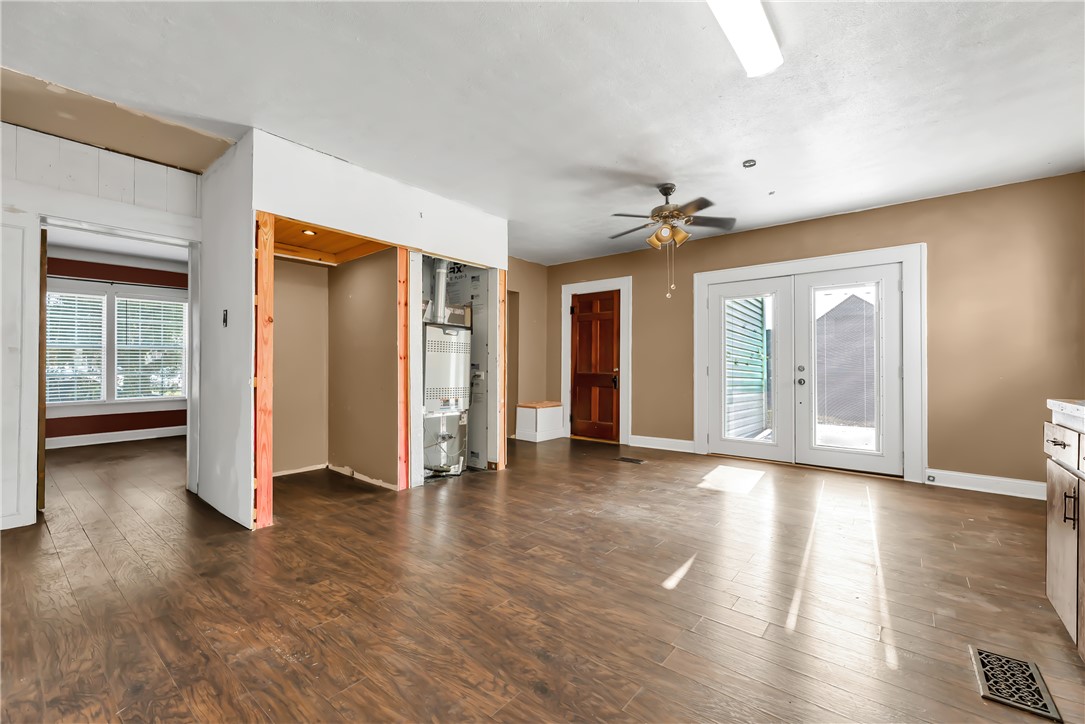 800 South Ennis Street Bryan, TX 77803 - Photo 12 of 38 a view of an empty room with glass door and a window