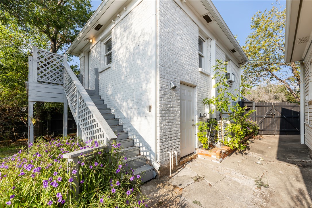 800 South Ennis Street Bryan, TX 77803 - Photo 30 of 38 a view of a house with potted plants