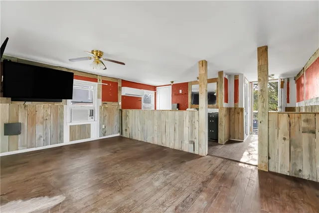 a view of a livingroom with a flat screen tv