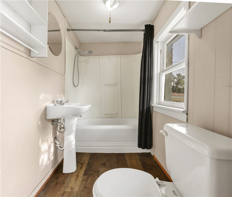 800 South Ennis Street Bryan, TX 77803 - Photo 37 of 38 a bathroom with a sink a toilet and shower