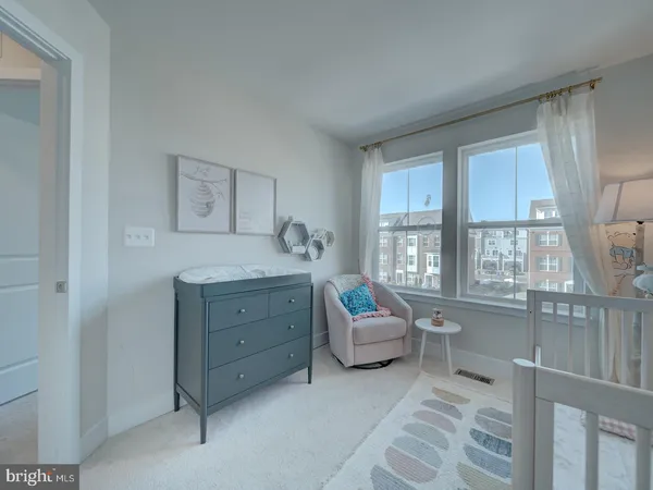 a room with a bed and a window