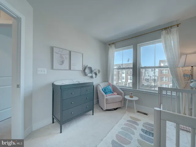 a room with a bed and a window