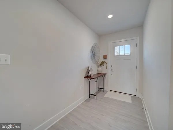 a view of room with a table and chairs