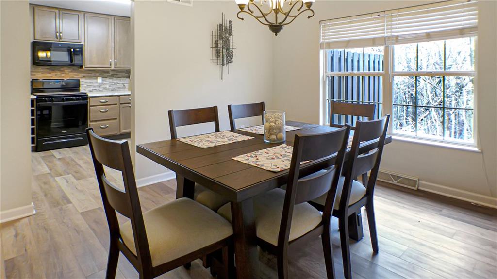 130 Terra Drive McKees Rocks, PA 15136 - Photo 12 of 38 a view of a dining room with furniture and wooden floor