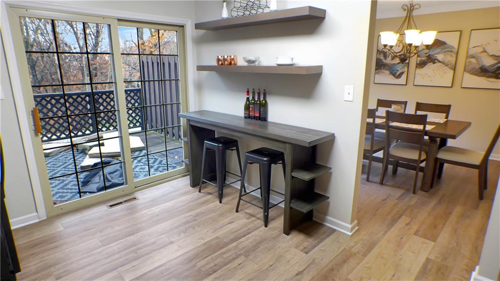 130 Terra Drive McKees Rocks, PA 15136 - Photo 14 of 38 a dining room with furniture and wooden floor