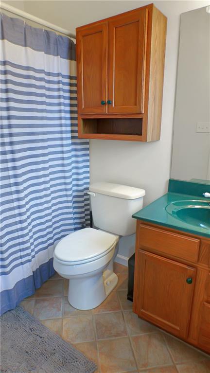 130 Terra Drive McKees Rocks, PA 15136 - Photo 20 of 38 a bathroom with a toilet and a sink