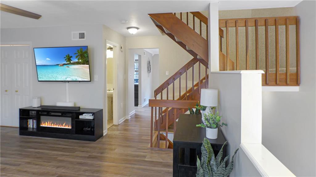 130 Terra Drive McKees Rocks, PA 15136 - Photo 7 of 38 a living room with furniture and a fireplace
