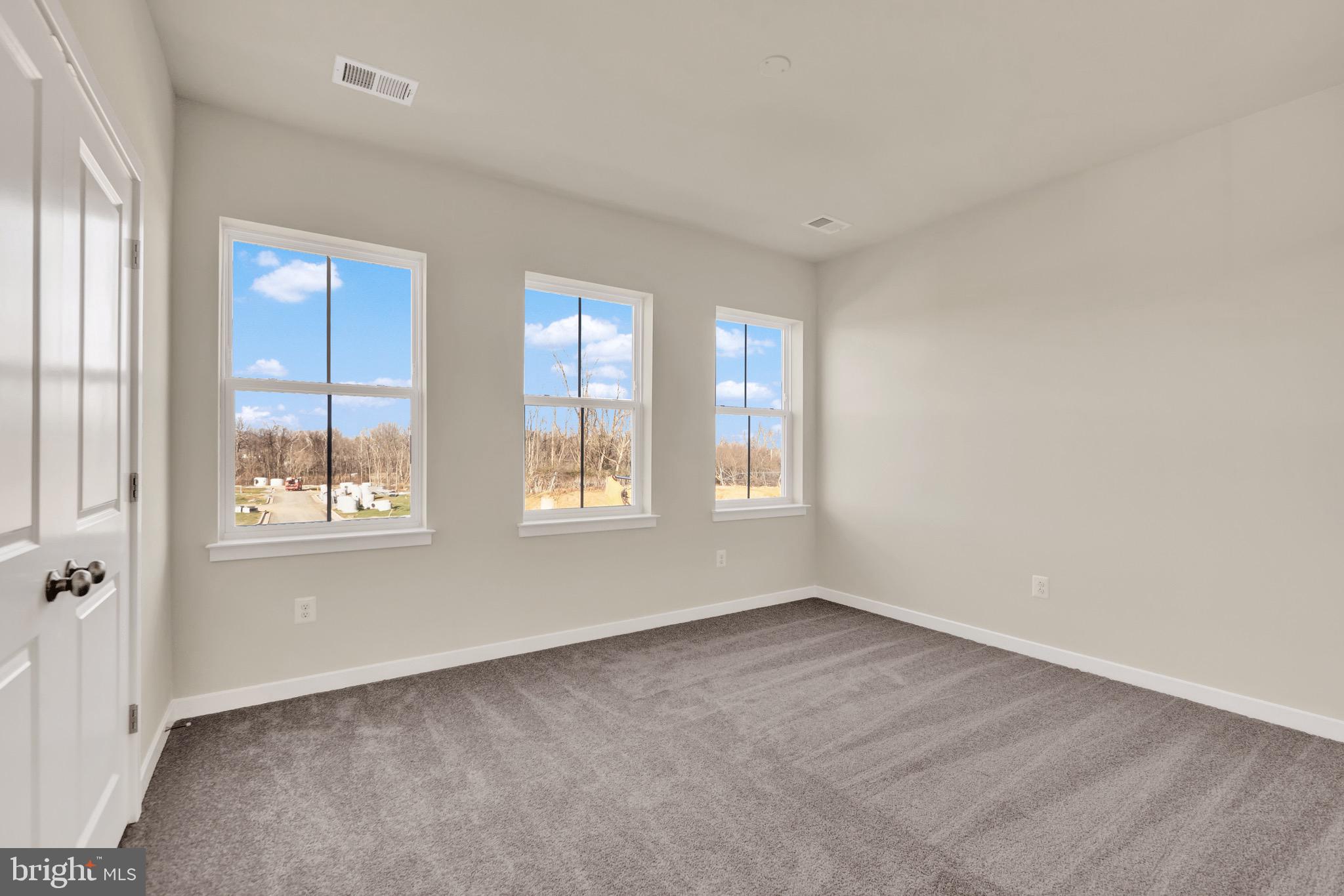 614 Mountain Laurel Boulevard Ranson, WV 25438 - Photo 11 of 28 a view of an empty room with a window