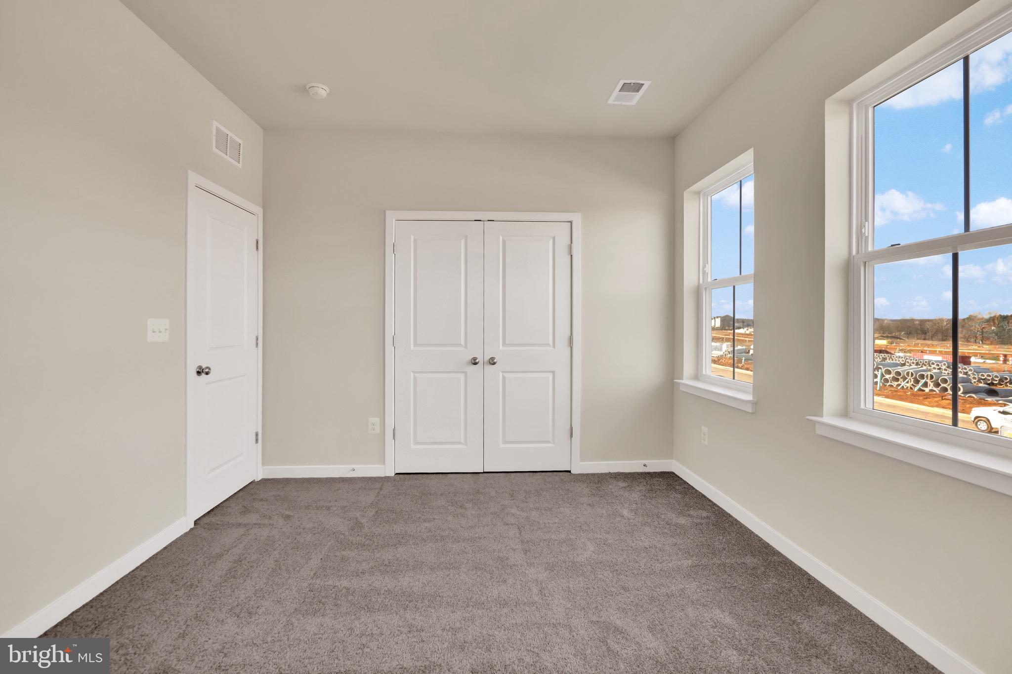 614 Mountain Laurel Boulevard Ranson, WV 25438 - Photo 12 of 28 a view of an empty room with a window