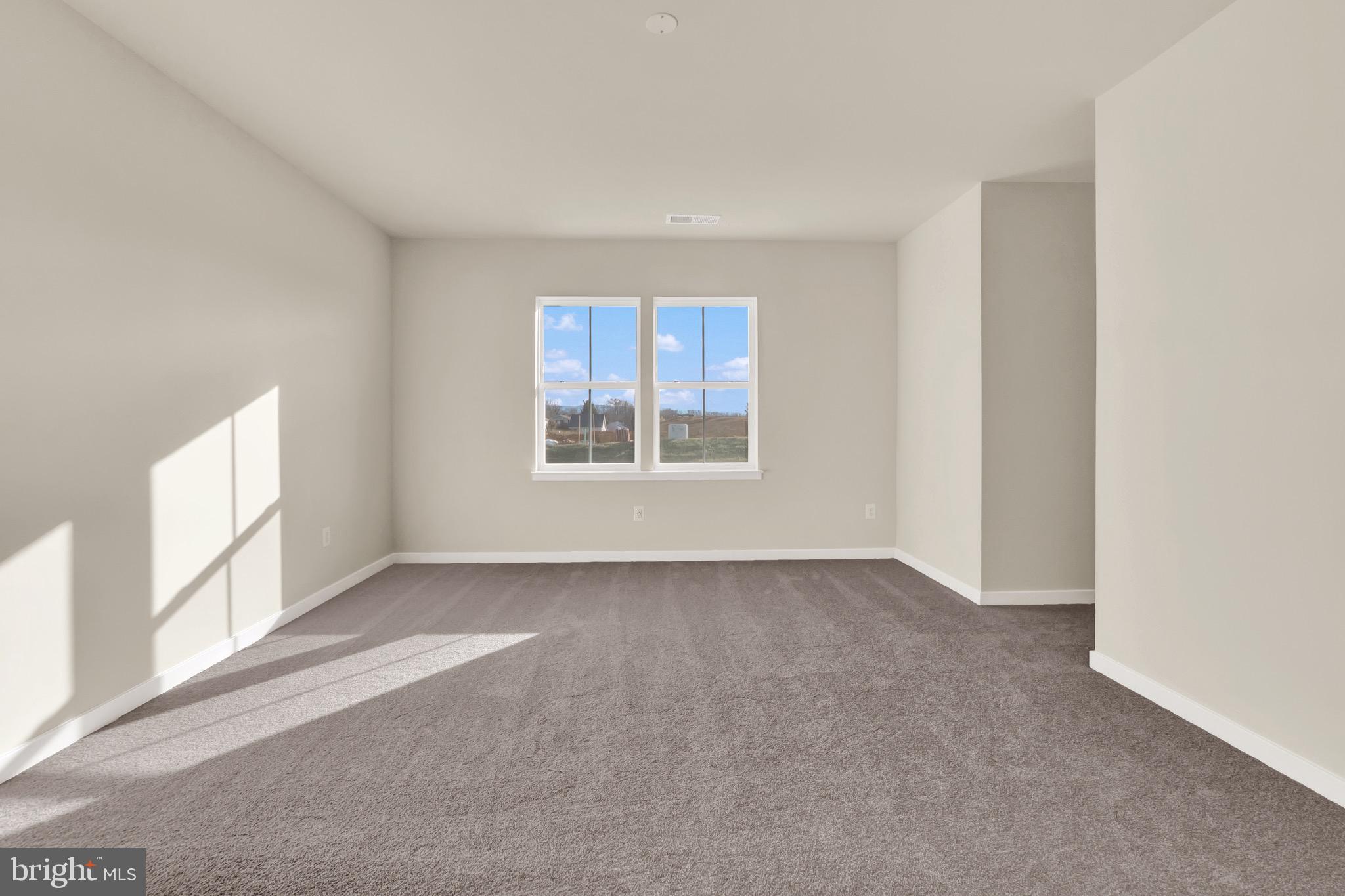 614 Mountain Laurel Boulevard Ranson, WV 25438 - Photo 19 of 28 a view of an empty room with a window