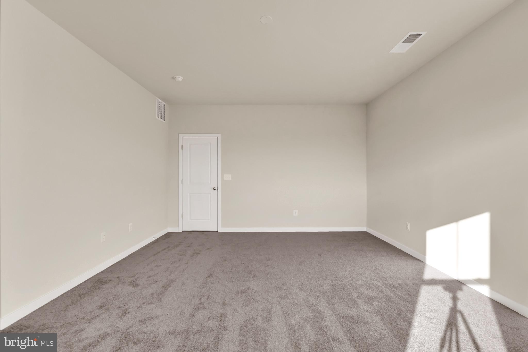 614 Mountain Laurel Boulevard Ranson, WV 25438 - Photo 21 of 28 a view of an empty room with a window