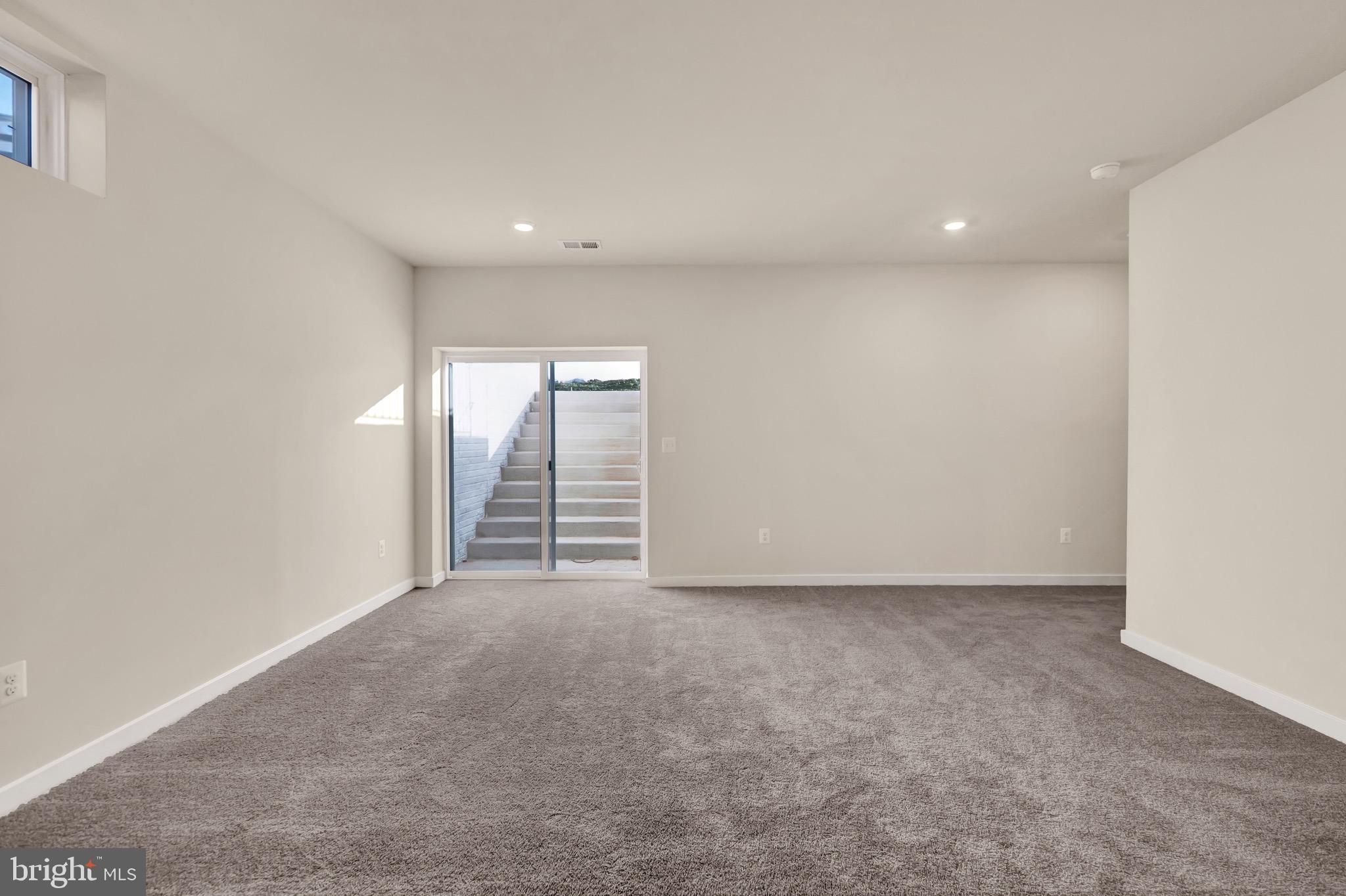 614 Mountain Laurel Boulevard Ranson, WV 25438 - Photo 24 of 28 a view of an empty room with a window