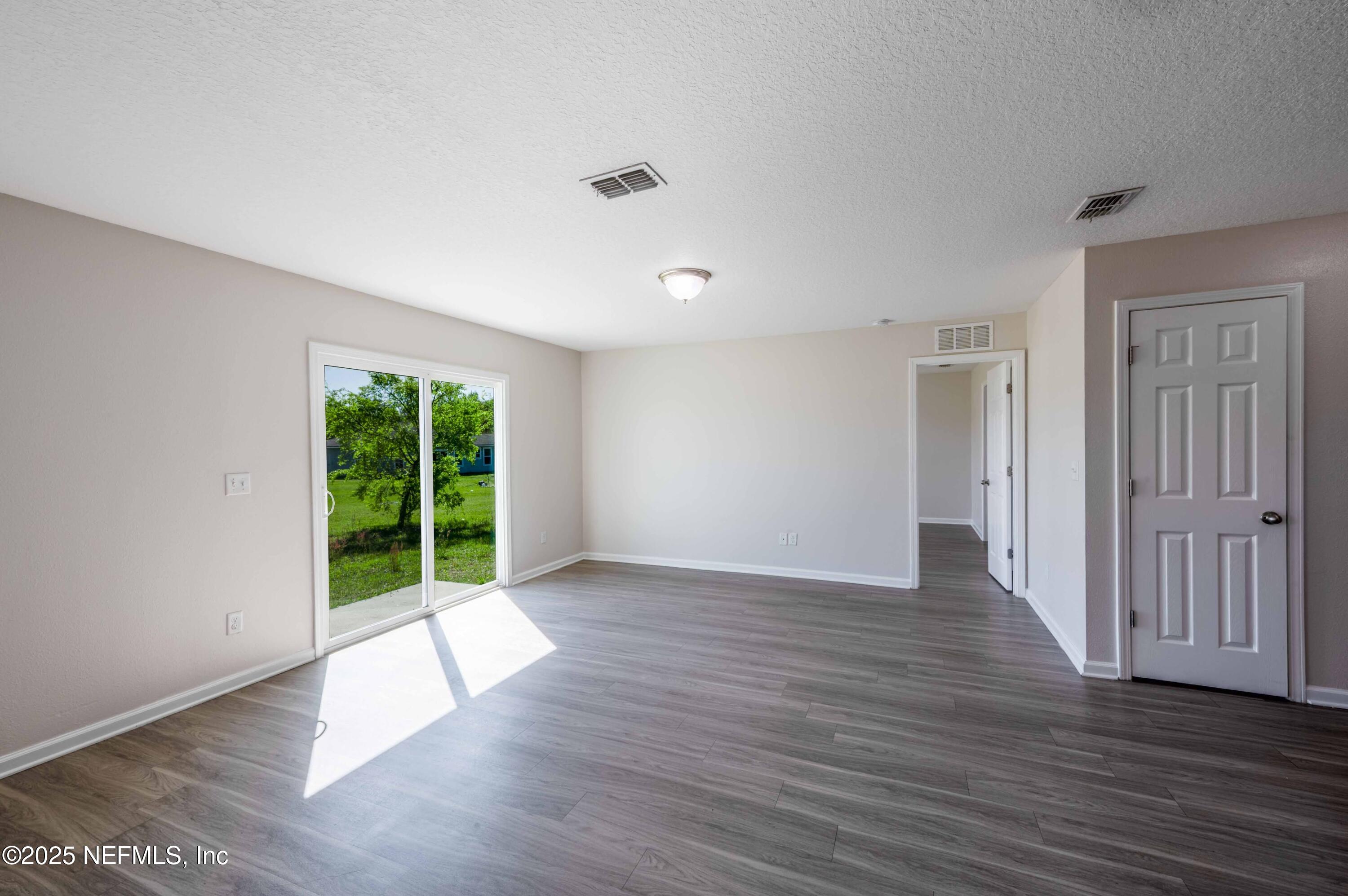 8165 Radican Road Jacksonville, FL 32219 - Photo 15 of 38 2025_03_11 8165 Radican Rd-061-living ro