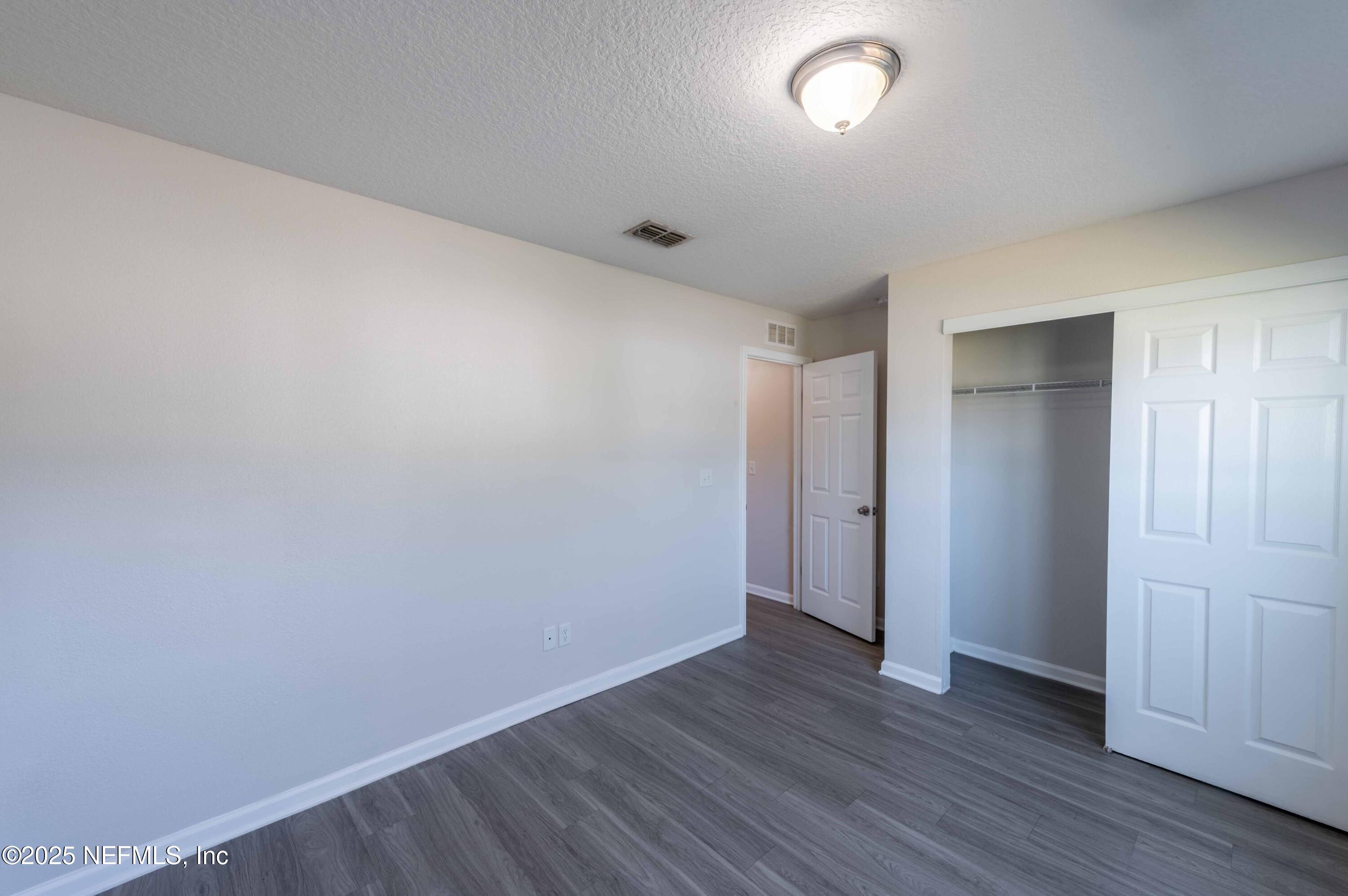 8165 Radican Road Jacksonville, FL 32219 - Photo 21 of 38 2025_03_11 8165 Radican Rd-007-bedroom 2