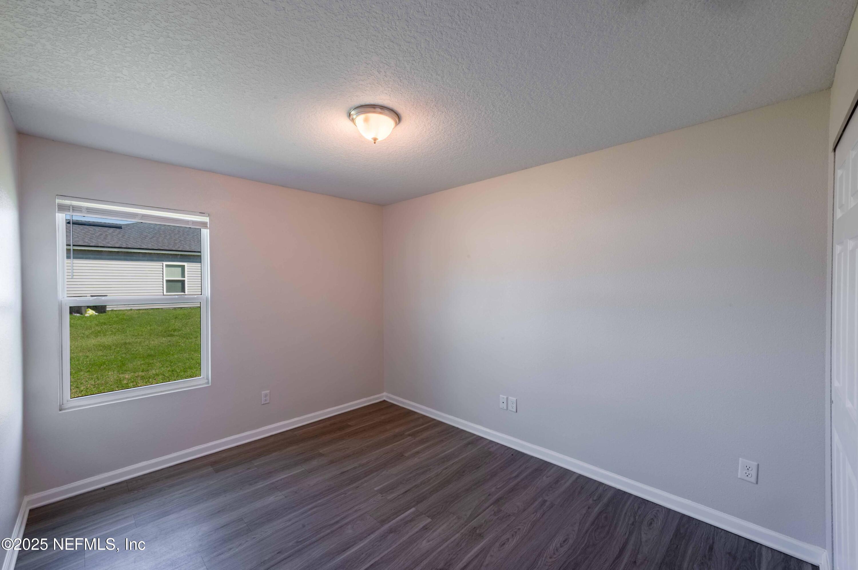 8165 Radican Road Jacksonville, FL 32219 - Photo 23 of 38 2025_03_11 8165 Radican Rd-013-bedroom 3