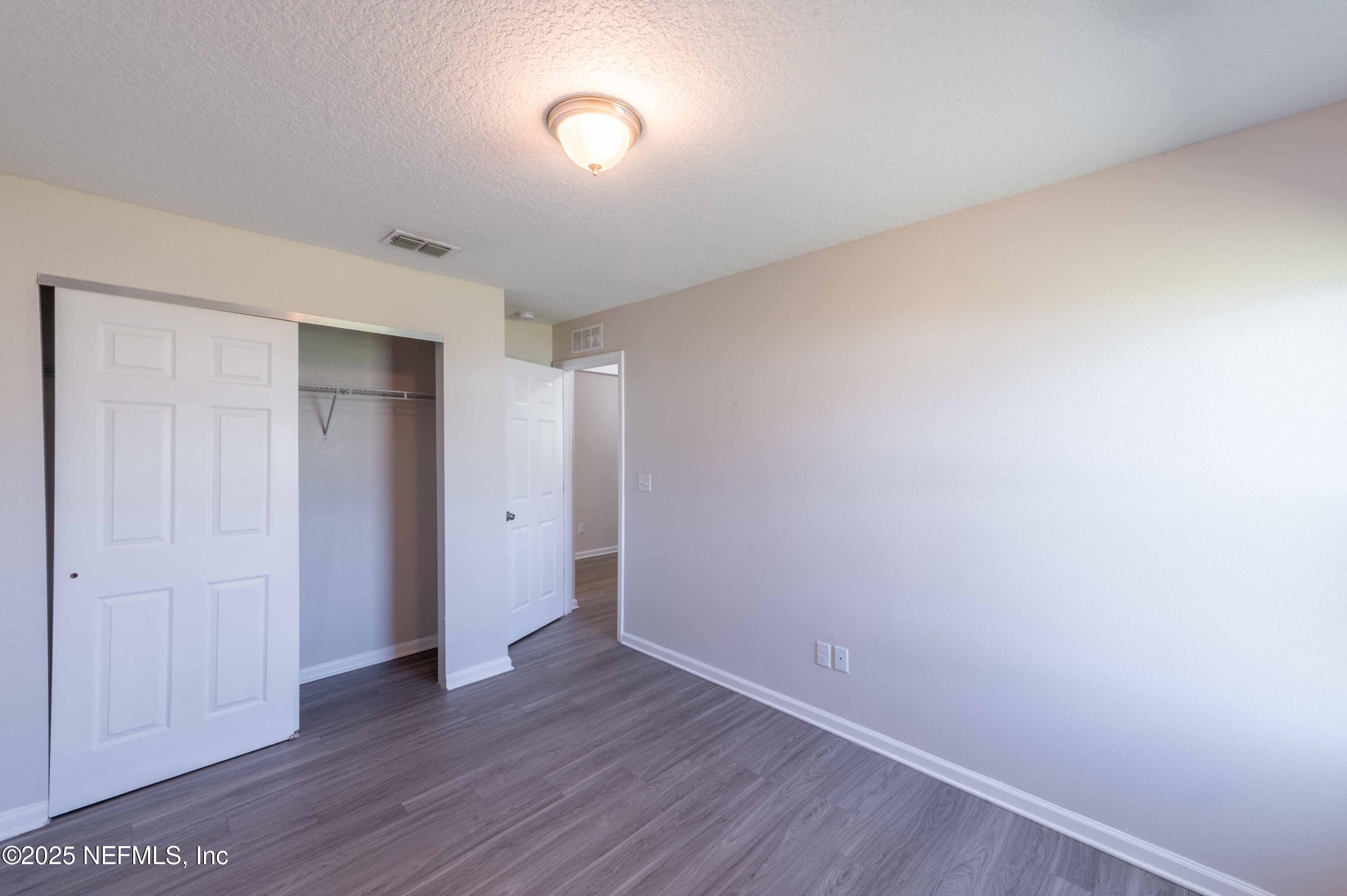 8165 Radican Road Jacksonville, FL 32219 - Photo 24 of 38 2025_03_11 8165 Radican Rd-016-bedroom 3
