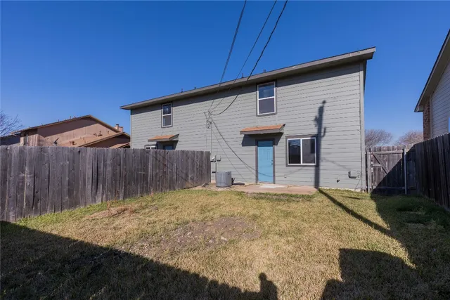a front view of house with a yard