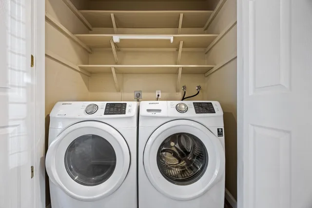 a utility room with dryer and washer