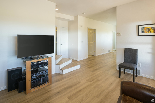 684 Blue Mountain Ridge Monticello, UT 84535 - Photo 35 of 71 Living room with light wood-style floors and baseboards