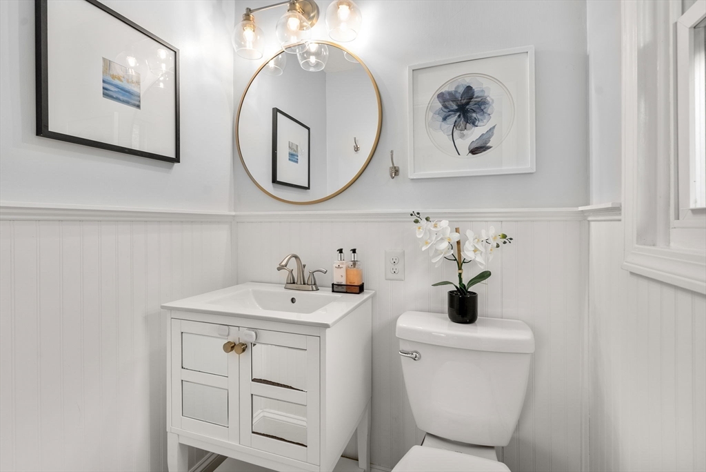 62 Gregory Road Framingham, MA 01701 - Photo 13 of 24 a bathroom with a sink and a mirror