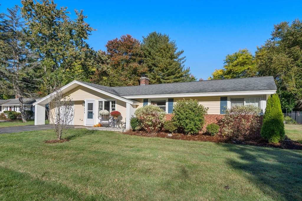 62 Gregory Road Framingham, MA 01701 - Photo 17 of 24 a house that is sitting in the grass
