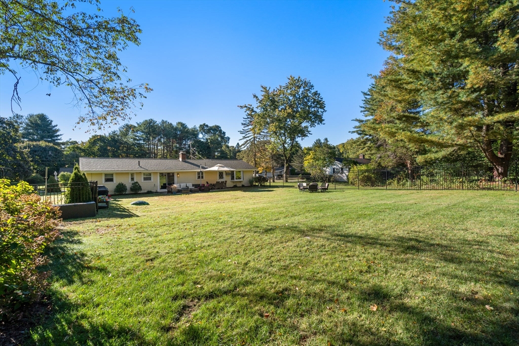 62 Gregory Road Framingham, MA 01701 - Photo 20 of 24 a view of yard with swimming pool and green space