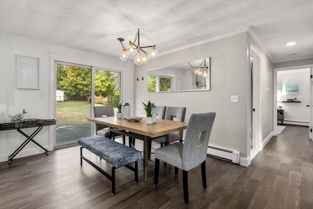62 Gregory Road Framingham, MA 01701 - Photo 6 of 24 a view of a dining room with furniture window and wooden floor