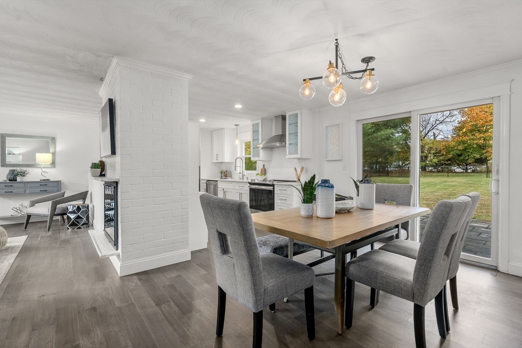62 Gregory Road Framingham, MA 01701 - Photo 7 of 24 a view of a dining room with furniture window and wooden floor