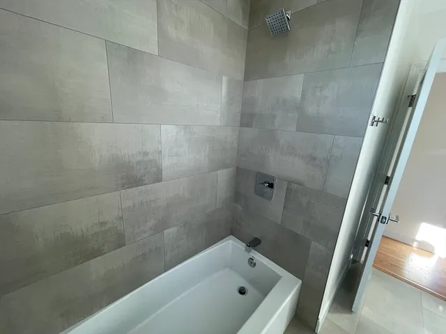 a bathroom with a bathtub