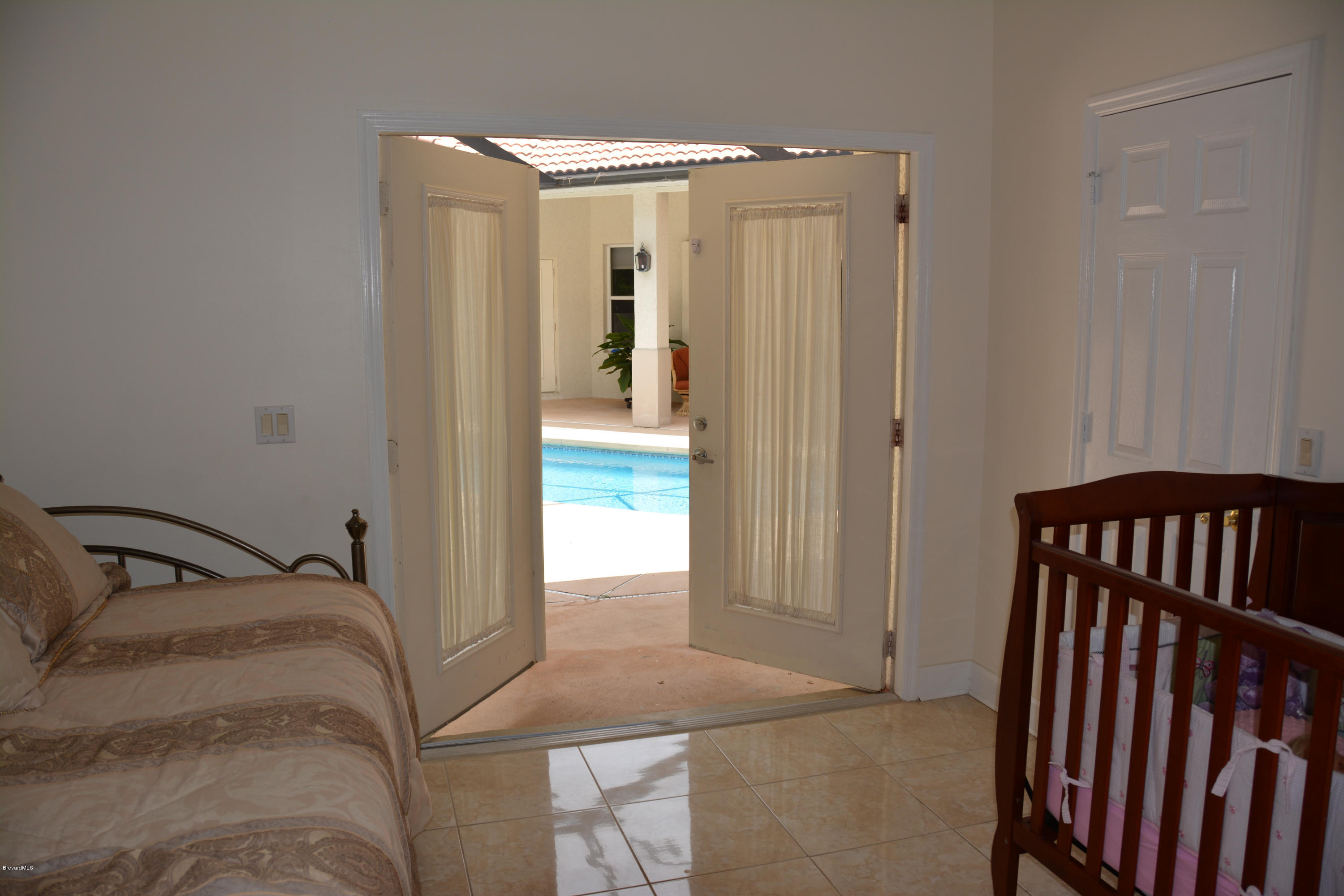 4262 Turtle Mound Road Melbourne, FL 32934 - Photo 22 of 35 Bedroom 3 - Lg Walk-in Closet