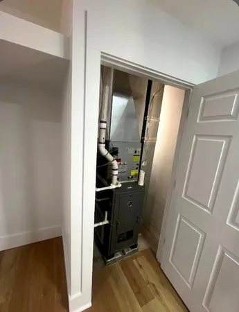 a view of a bathroom from a hallway