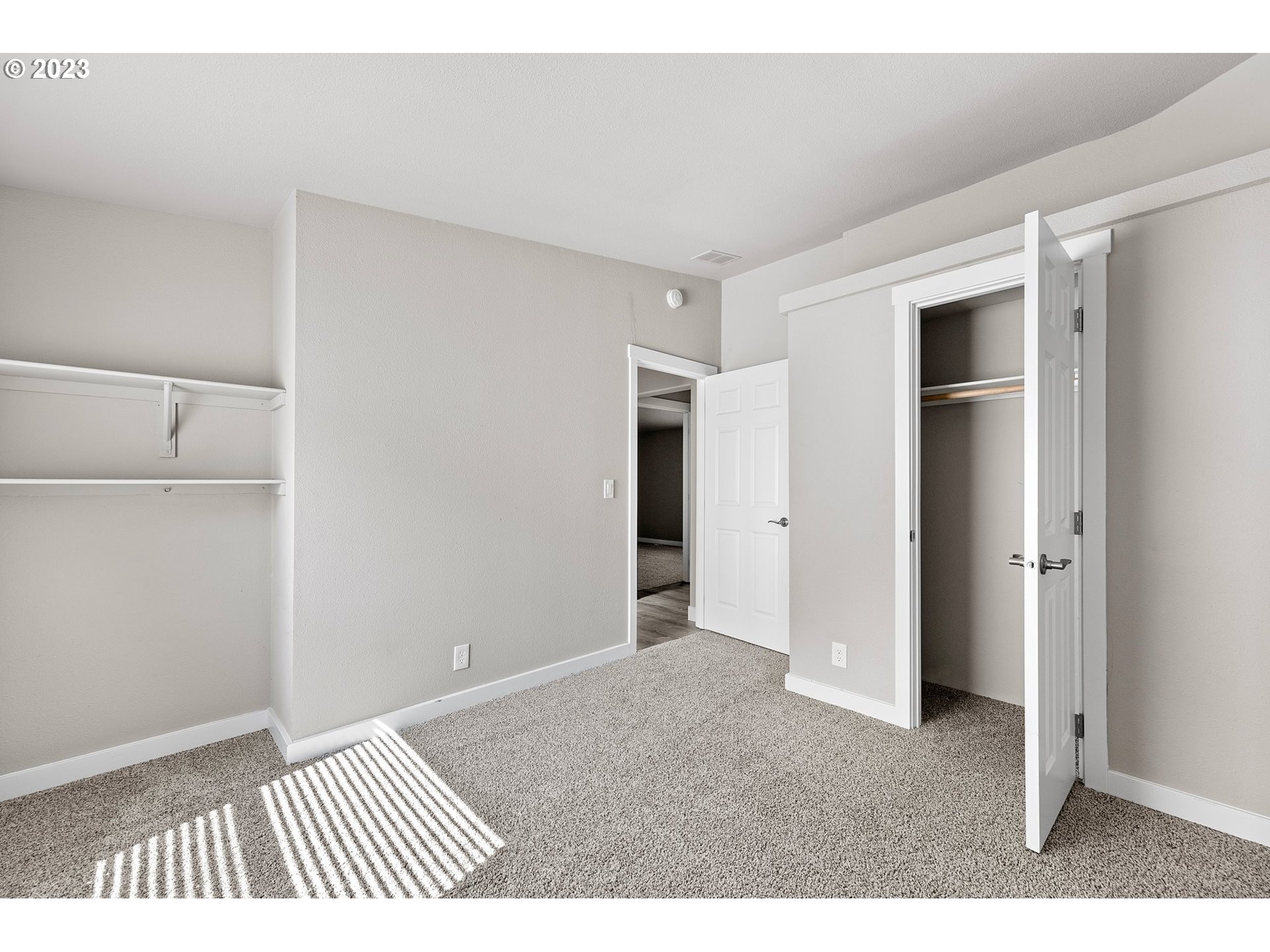 39895 Deerhorn Road Springfield, OR 97478 - Photo 30 of 46 a view of an empty room with wooden floor