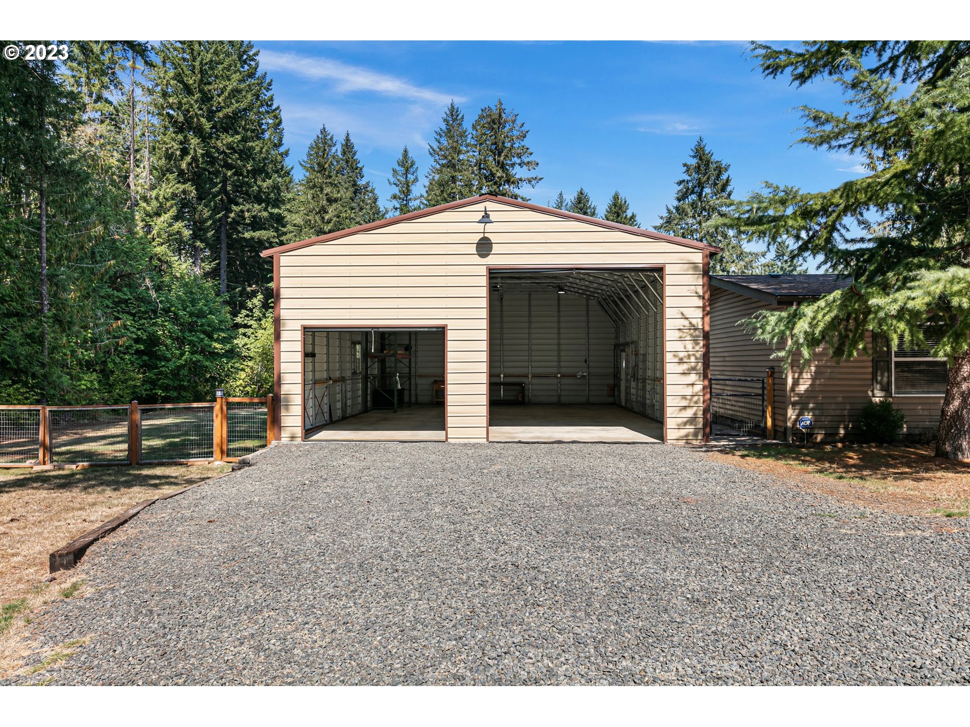 39895 Deerhorn Road Springfield, OR 97478 - Photo 5 of 46 a view of a house with a yard and potted plants