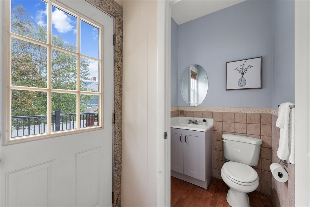 29 Garnet Road Boston, MA 02132 - Photo 17 of 42 a white toilet sitting next to a bathroom sink