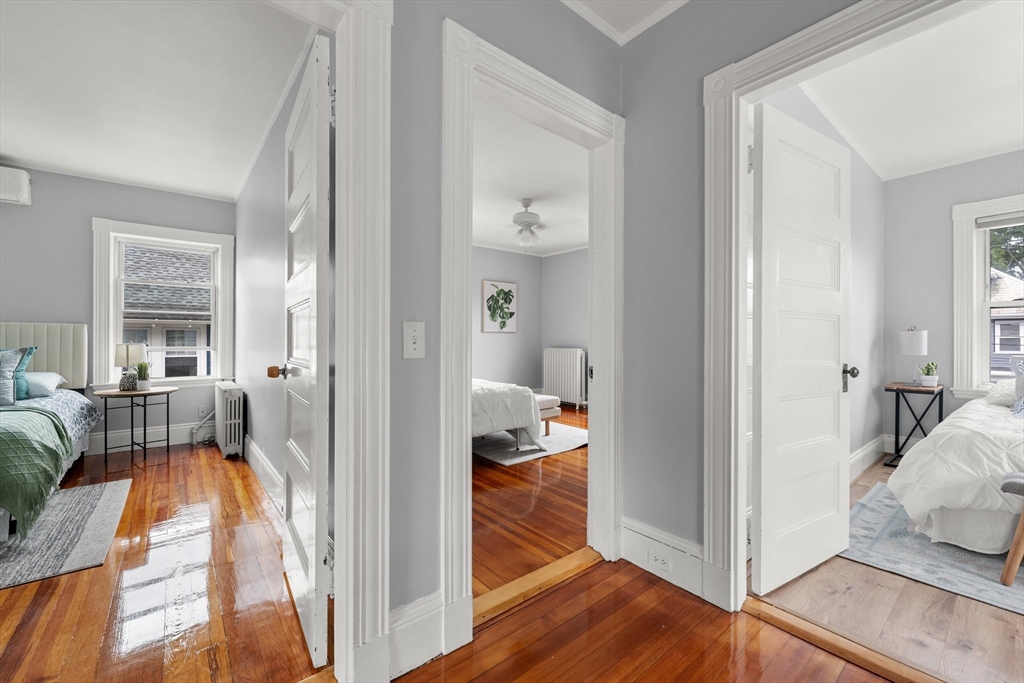 29 Garnet Road Boston, MA 02132 - Photo 21 of 42 a view of bedroom with wooden floor
