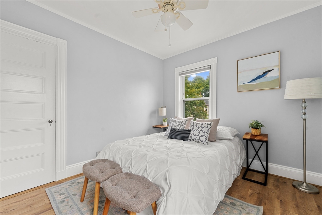 29 Garnet Road Boston, MA 02132 - Photo 23 of 42 a bedroom with a bed and a window