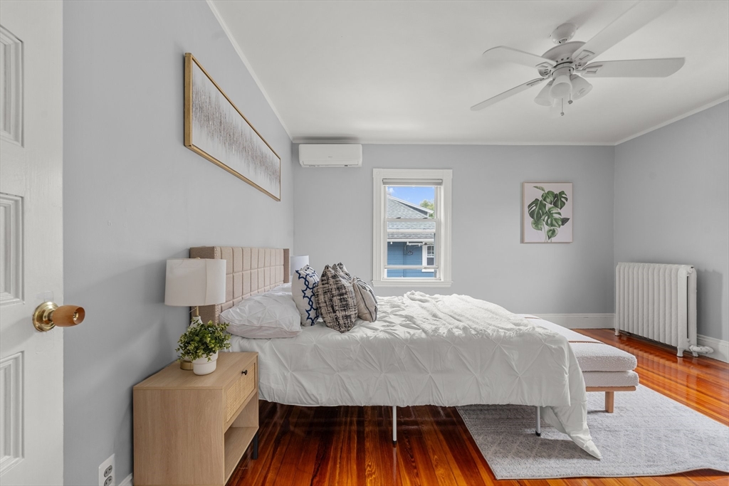 29 Garnet Road Boston, MA 02132 - Photo 26 of 42 a living room with furniture and a table