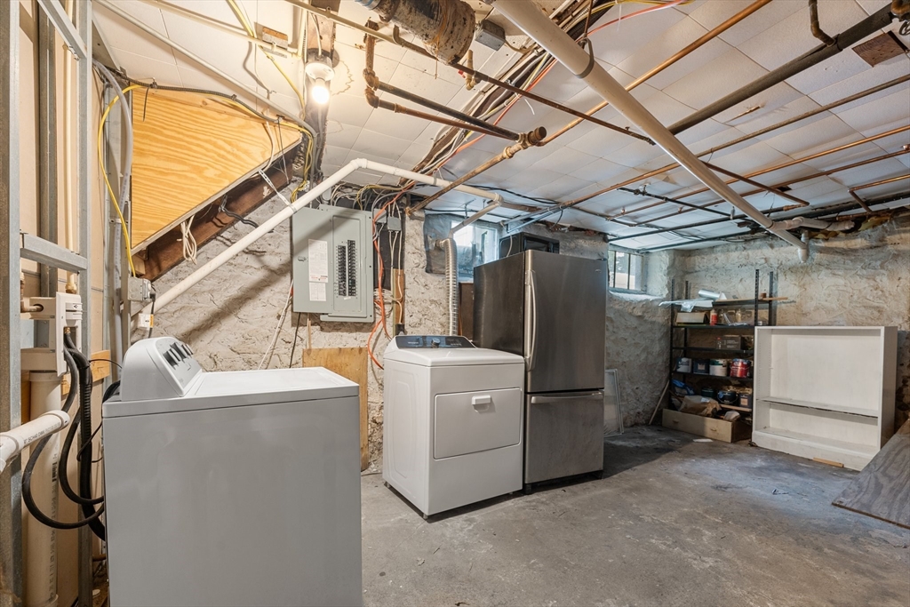 29 Garnet Road Boston, MA 02132 - Photo 38 of 42 a view of a storage & utility room with washer and dryer