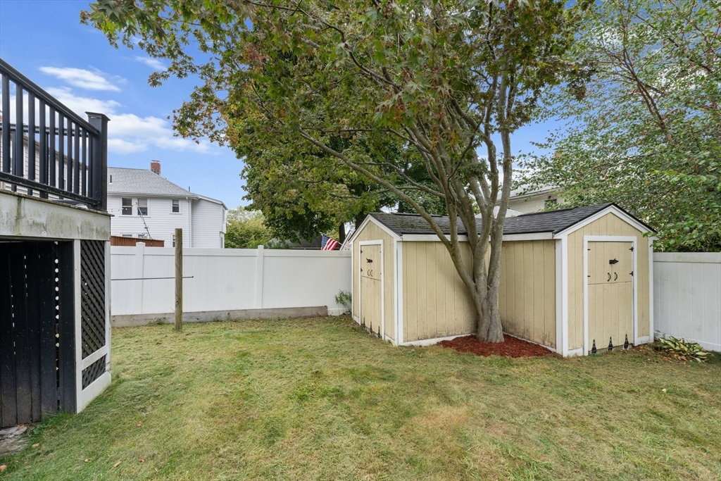29 Garnet Road Boston, MA 02132 - Photo 41 of 42 a view of a house with a yard