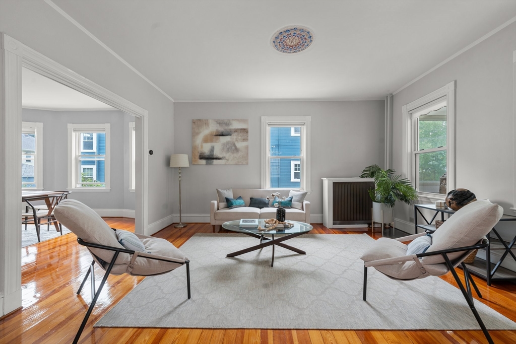 29 Garnet Road Boston, MA 02132 - Photo 6 of 42 a living room with furniture and a window