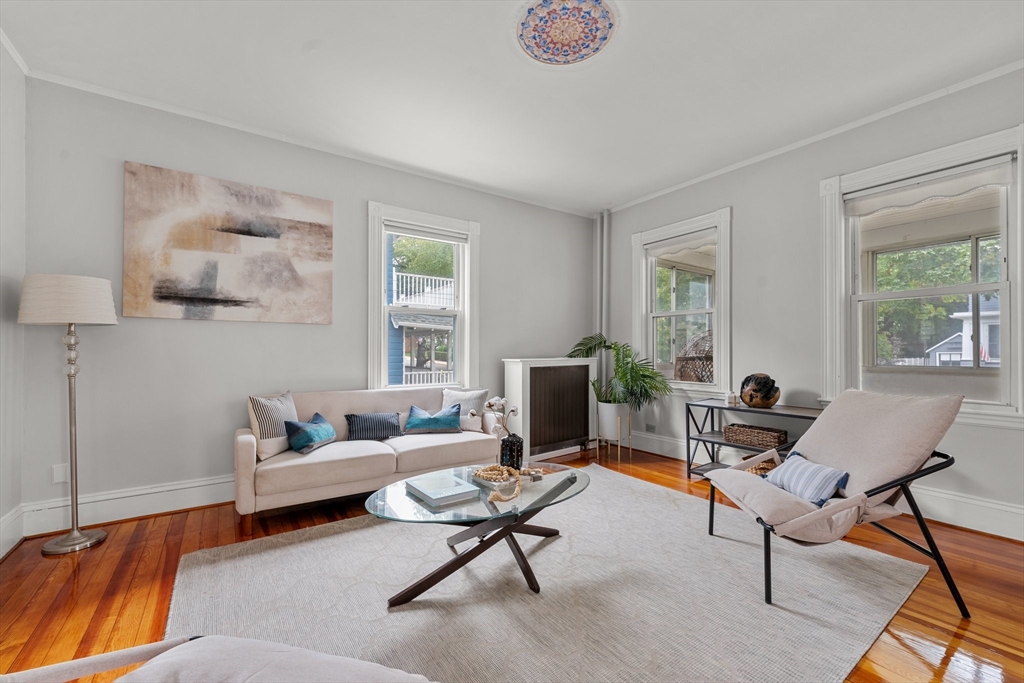 29 Garnet Road Boston, MA 02132 - Photo 7 of 42 a living room with furniture and windows