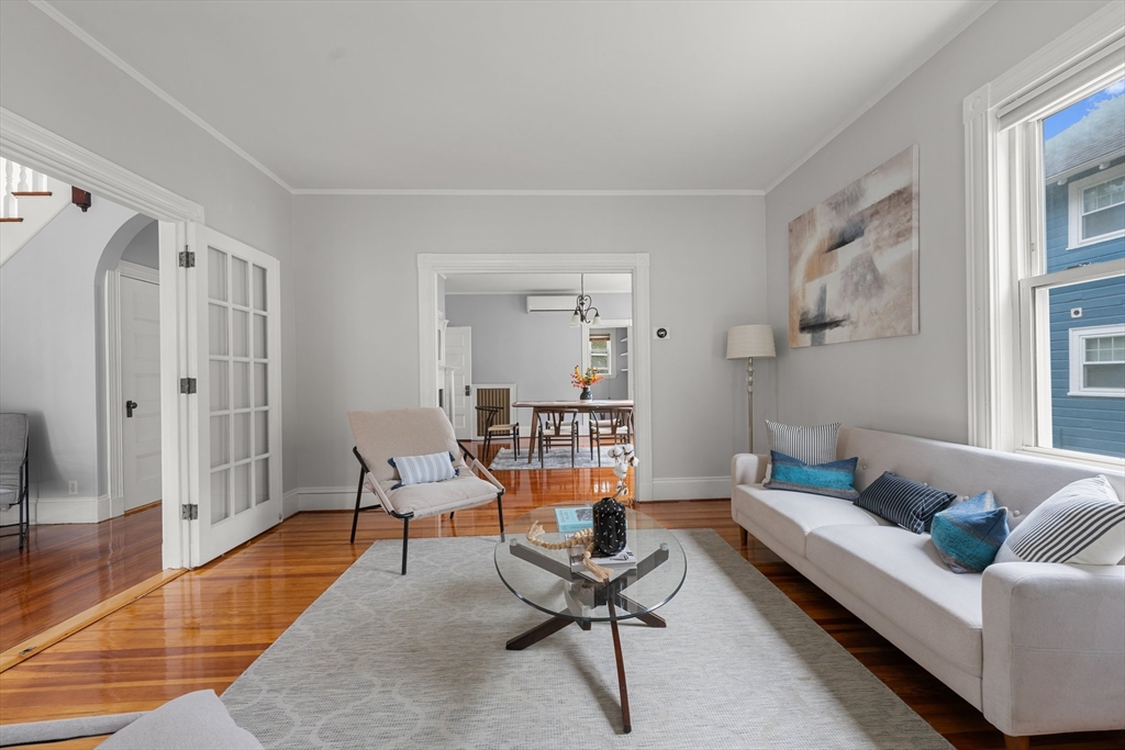 29 Garnet Road Boston, MA 02132 - Photo 8 of 42 a living room with furniture and a rug