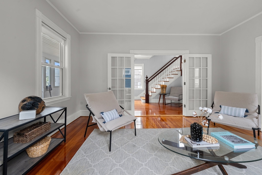 29 Garnet Road Boston, MA 02132 - Photo 9 of 42 a living room with furniture and wooden floor