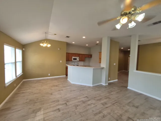 a view of kitchen and windows